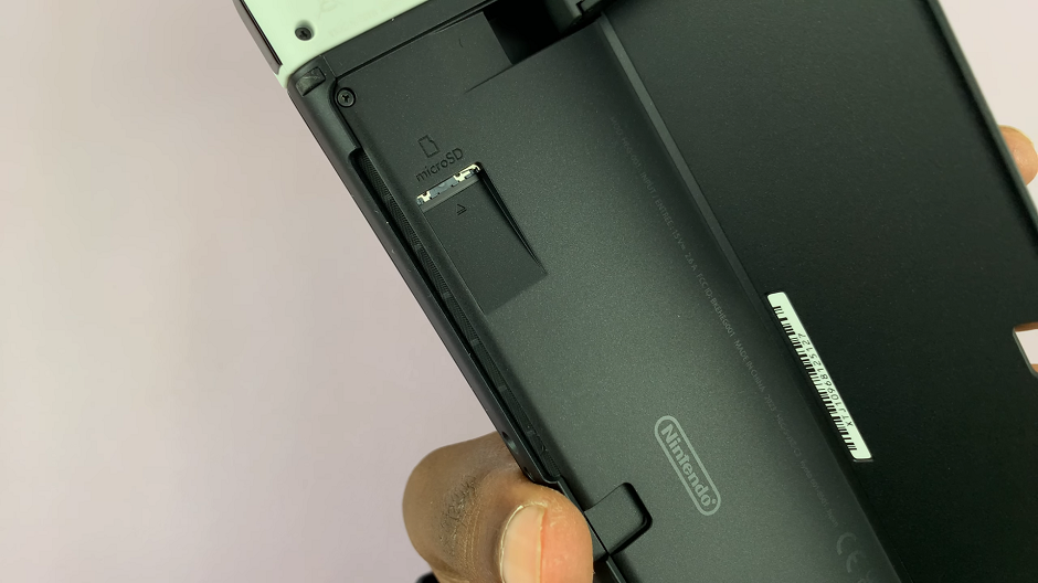 How To Insert SD Card In Nintendo Switch (OLED)